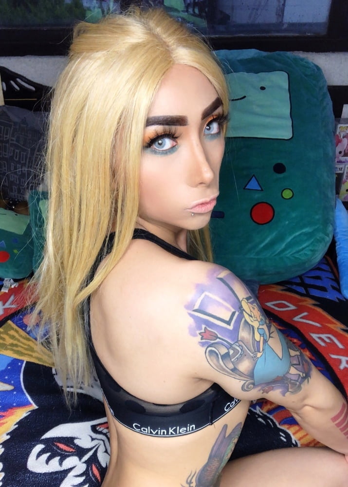Blonde tattoo tranny