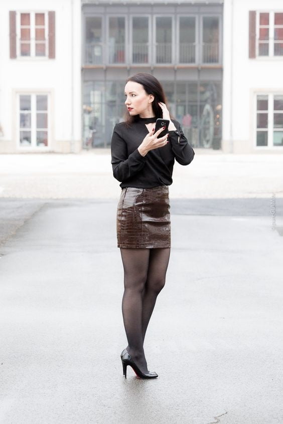 Leather mini and black pantyhose video