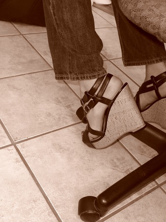 girls feet in wedges heels