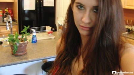 brunette cutie gets some cum over herself         