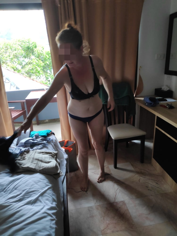 Wife on holiday - 21 Photos 