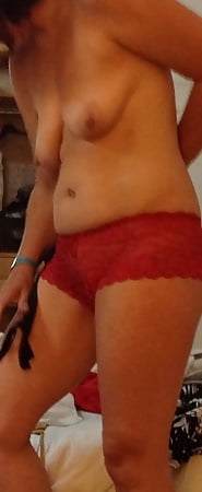 Wife in sexy red panties showing tits