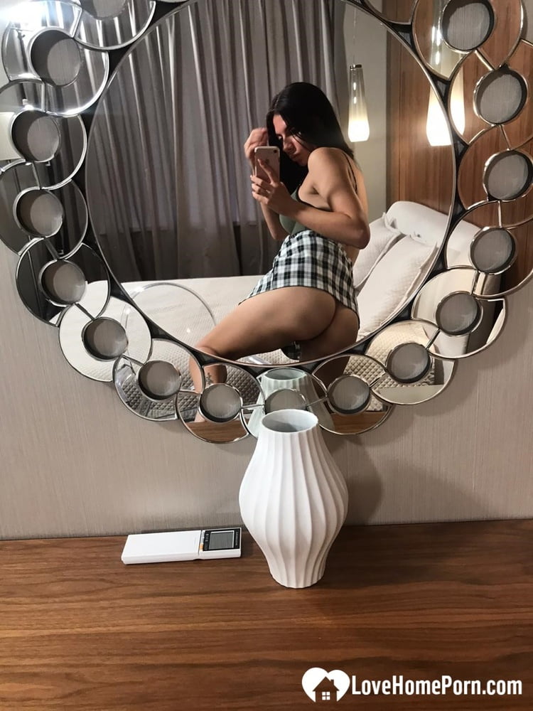 Hot schoolgirl reveals her tits in the mirror - 26 Photos 