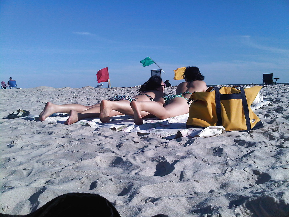 Sex Gallery asians laying on the beach