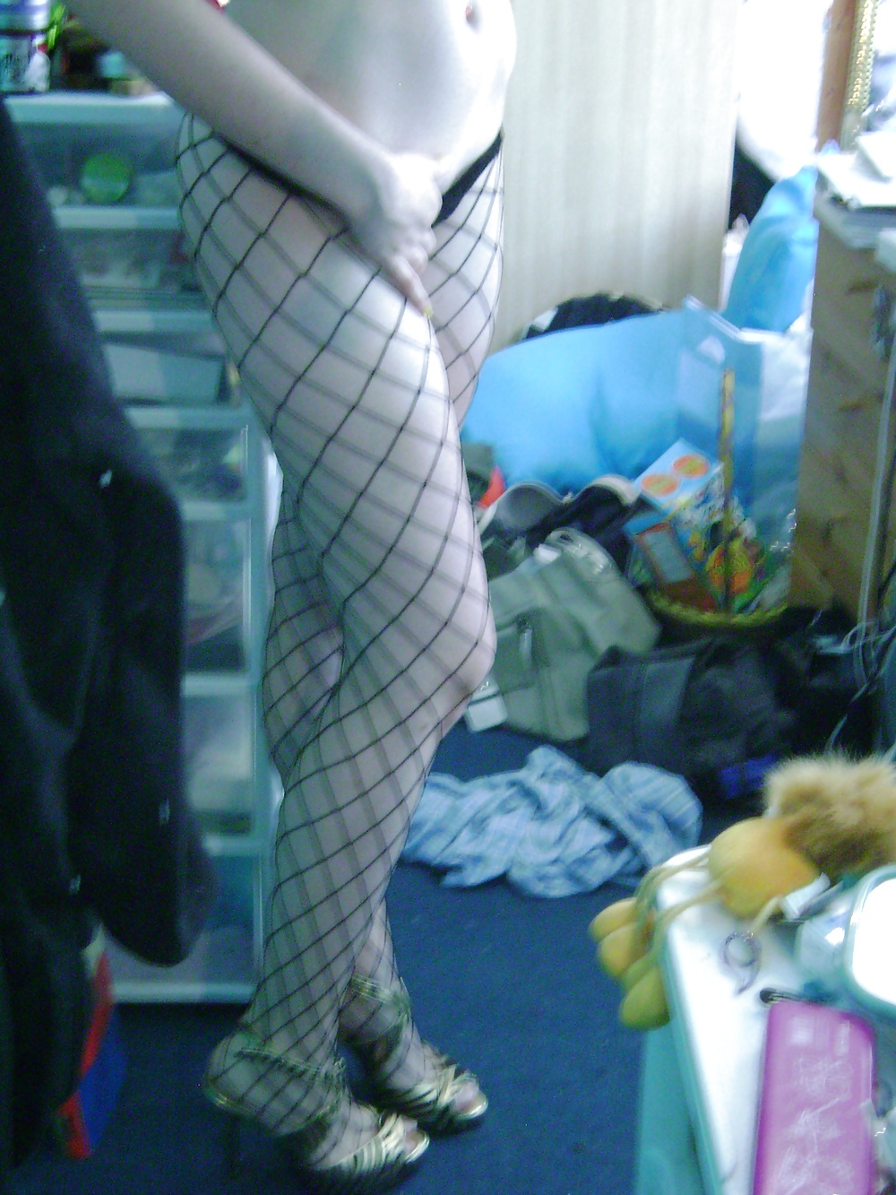 Sex Gallery girl wearing fishnet stockings