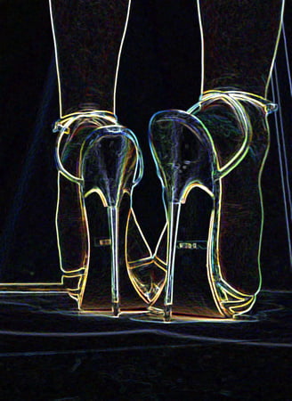 luminous contours of legs heels and ass         