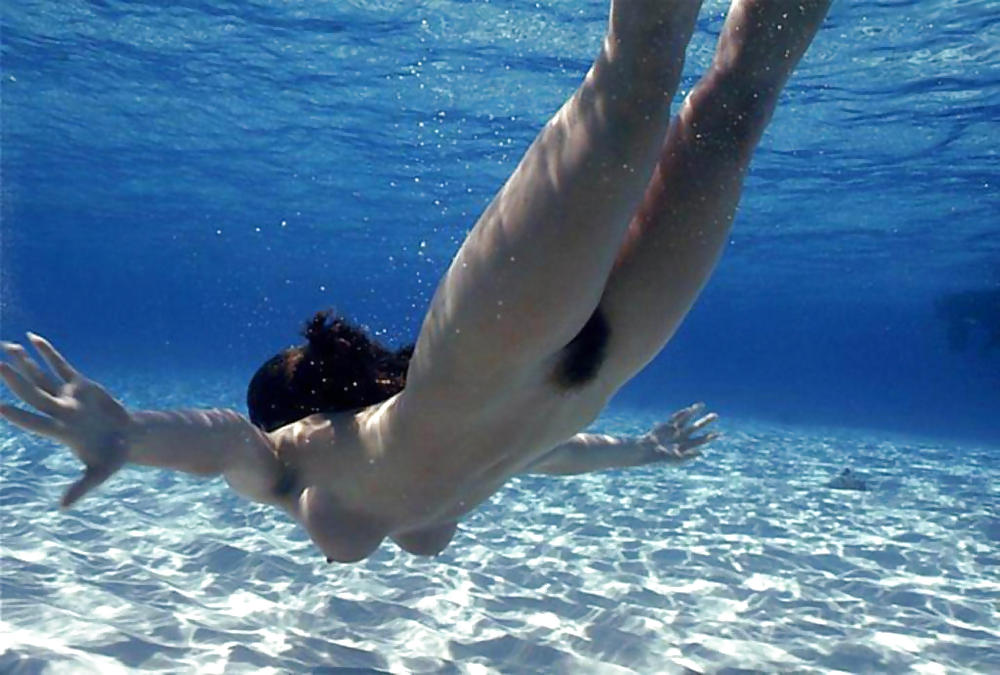 Naked Women Swimming Underwater.