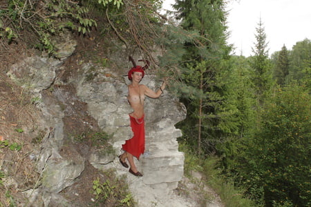 forest satyr on the rock         