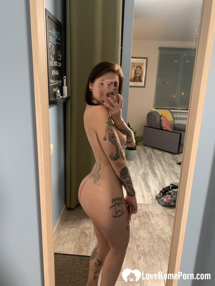 Tattooed babe taking selfies with amazing angles - 27 Photos 
