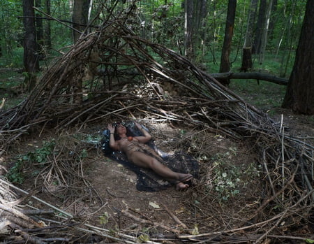 in forest cradle with apple         