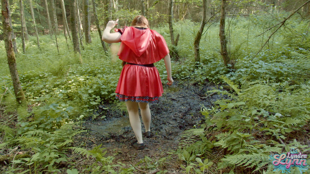 Red Riding hood in forest mud - 10 Photos 