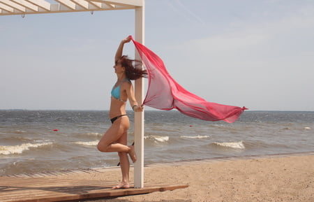red shawl on windy weather         