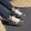 Jeans feet in worned nylon socks