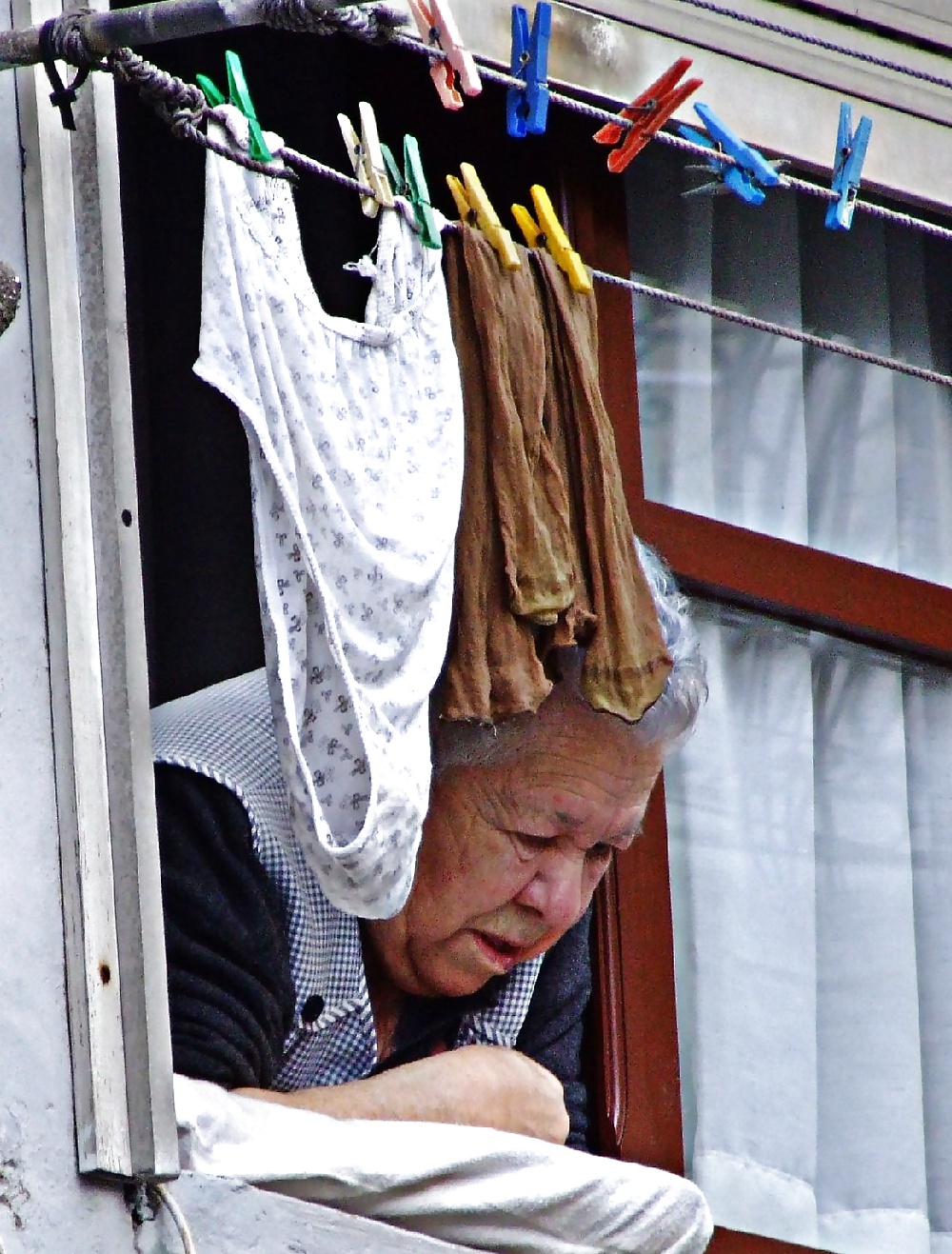 Sex Gallery Grannies on the balcony or in the window.