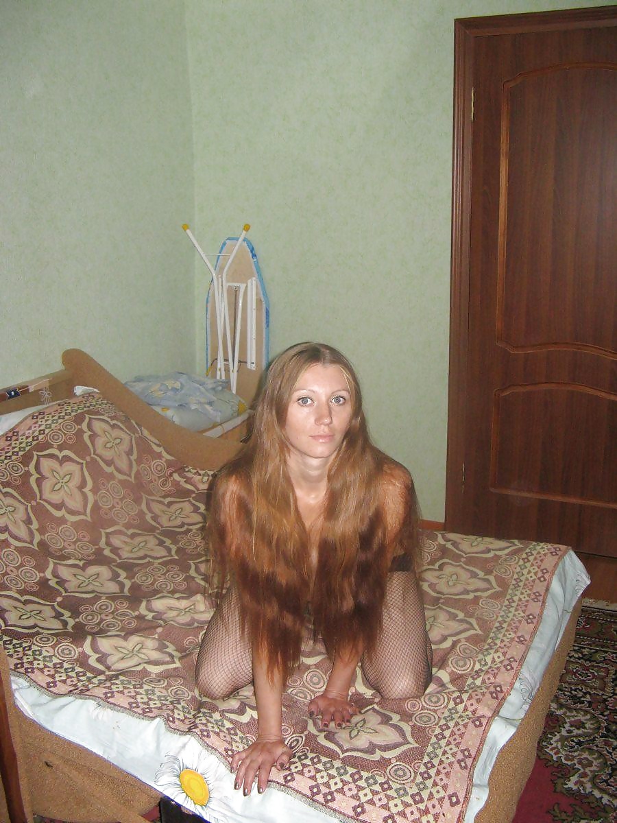 Sex Gallery Silly Russian redhead posing and sucking cock