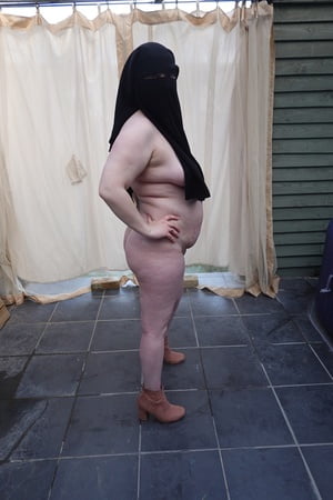 nude in niqab in ankle boots         
