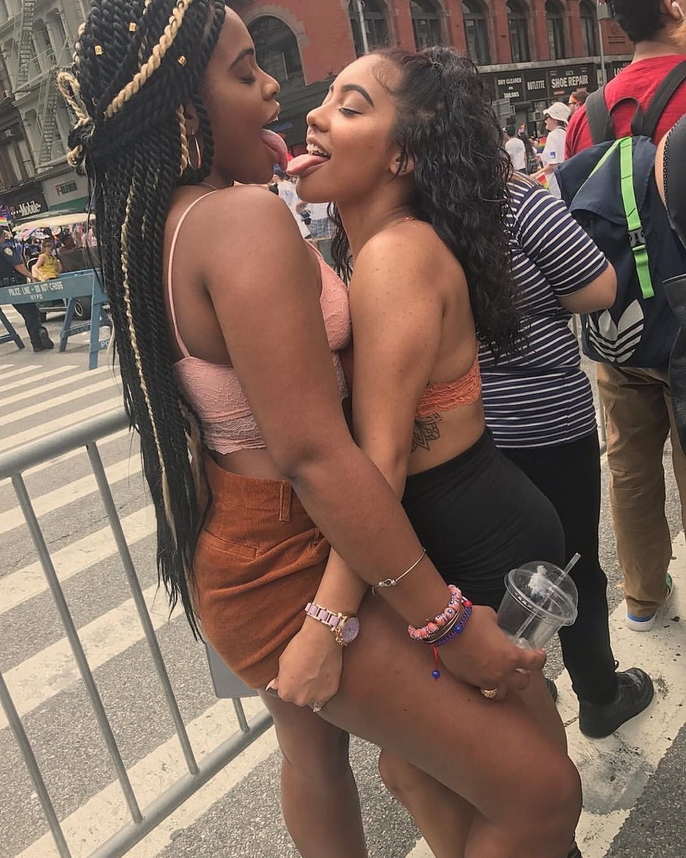 Ebony lesbian in front of crowd