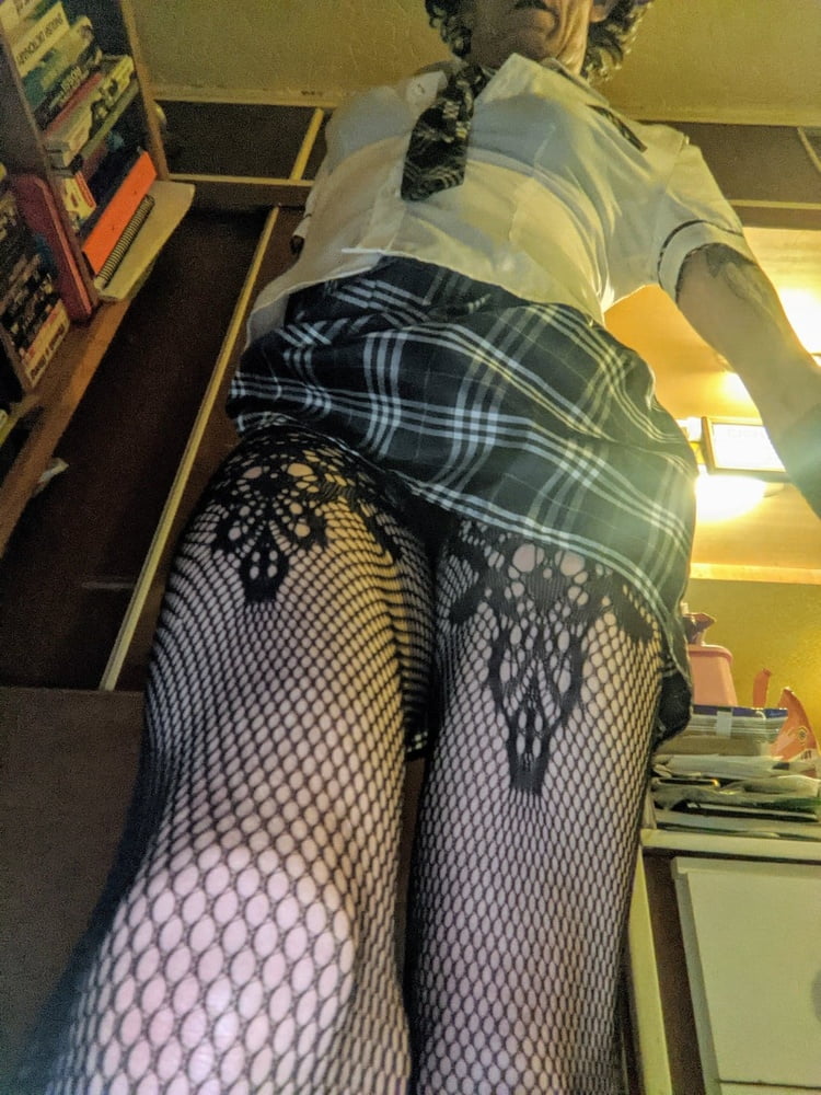Sexy schoolgirl uniform and stockings. - 9 Photos 