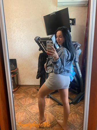 pregnant brunette in sheer pantyhose         